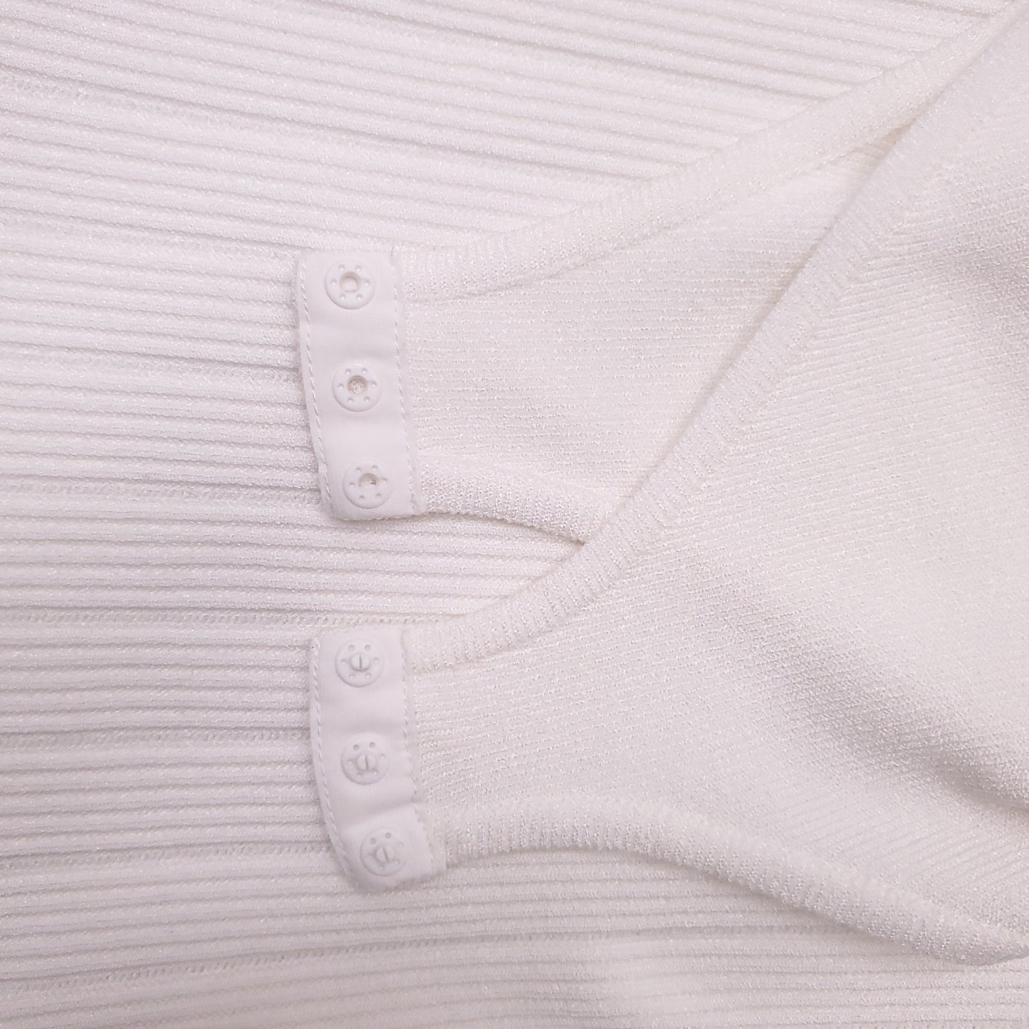 BALMAIN WHITE MOCK TURTLENECK KNIT BODYSUIT WITH SILVER BUTTONS - SIZE 36