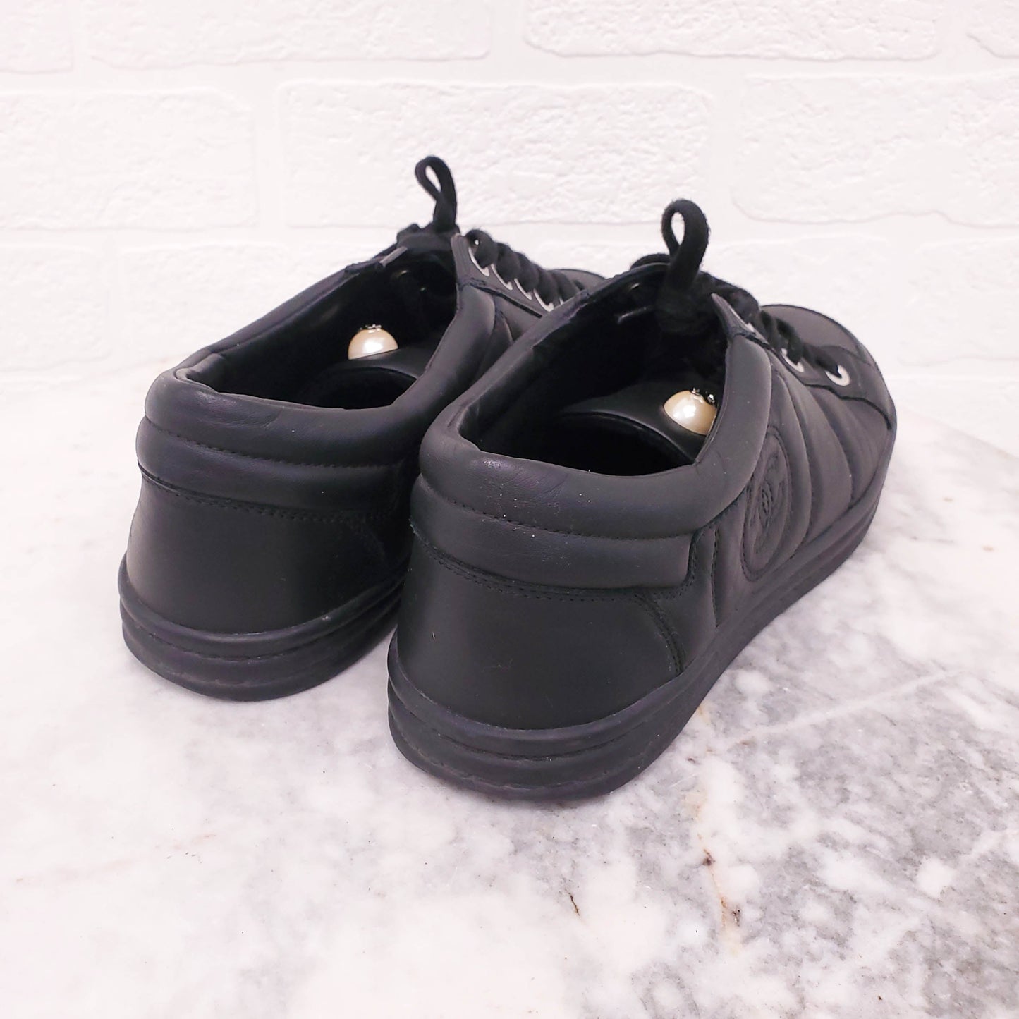 CHANEL BLACK SNEAKERS WITH PEARL DETAIL - SIZE 38.5
