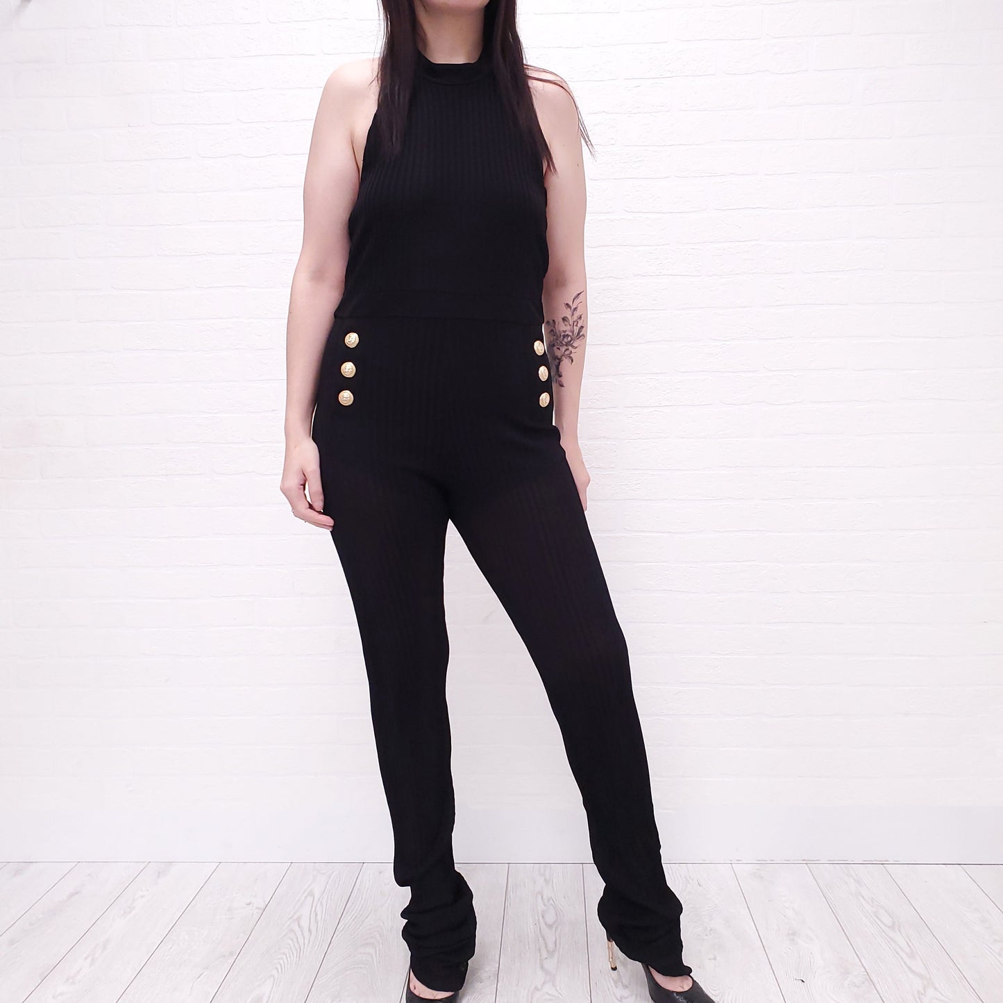 BALMAIN BLACK RIBBED JUMPSUIT WITH GOLD LOGO BUTTONS - SIZE 44
