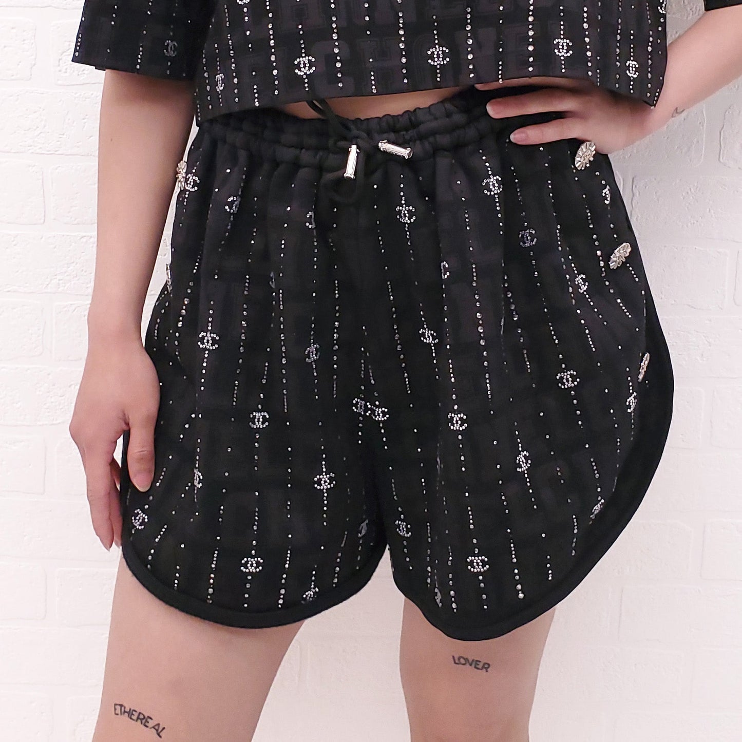 CHANEL 2023 CRUISE COLLECTION BLACK LOGO SHORTS WITH CRYSTAL DETAIL - SIZE 38