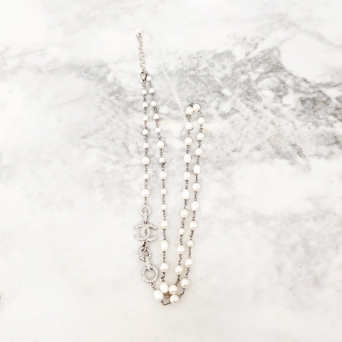 CHANEL PEARL AND SILVER CRYSTAL CHAIN LOGO NECKLACE