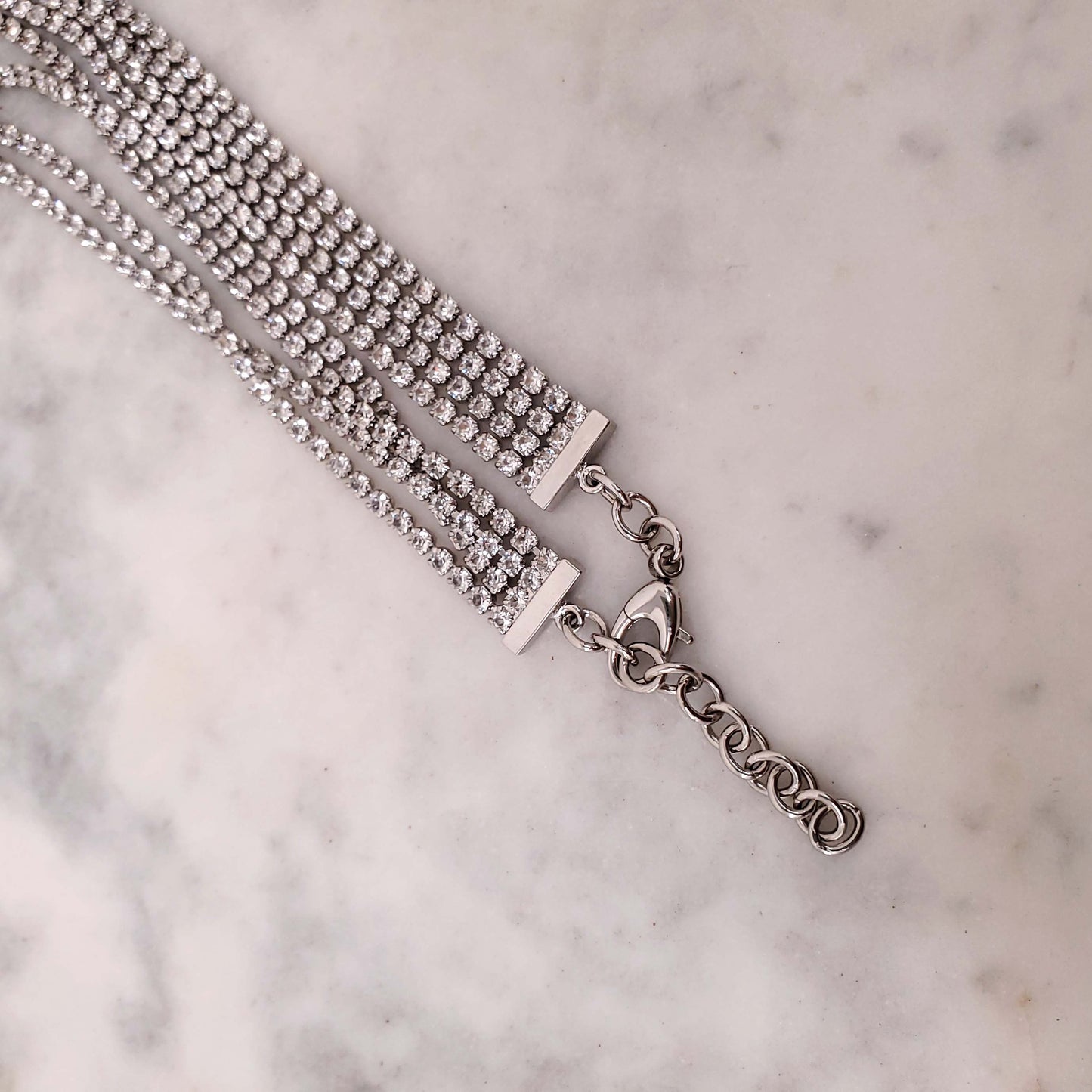 GUCCI CRYSTAL LOGO TRIANGLE FRINGE NECKLACE