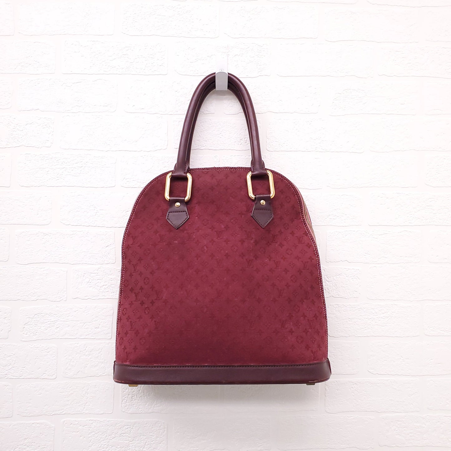 LOUIS VUITTON VINTAGE BURGUNDY MONOGRAM 'ALMA' BAG