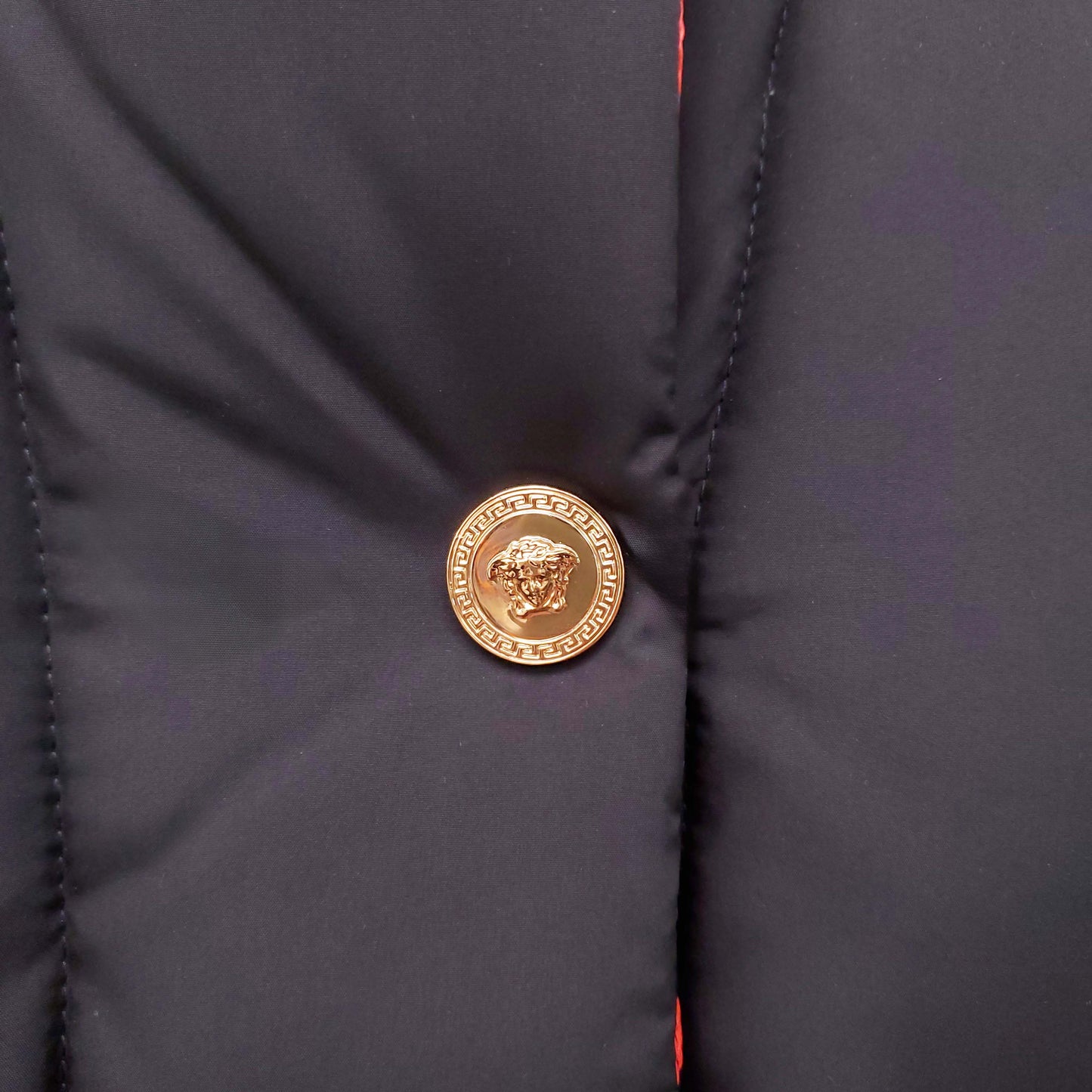 VERSACE BLACK, RED AND BLUE PATTERNED LOGO PUFFER JACKET WITH MEDUSA BUTTONS - SIZE 42