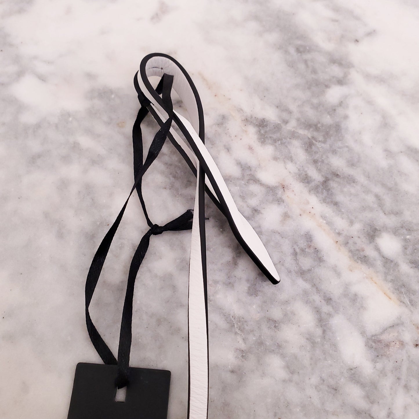 VERSACE WHITE STARFISH BAG CHARM